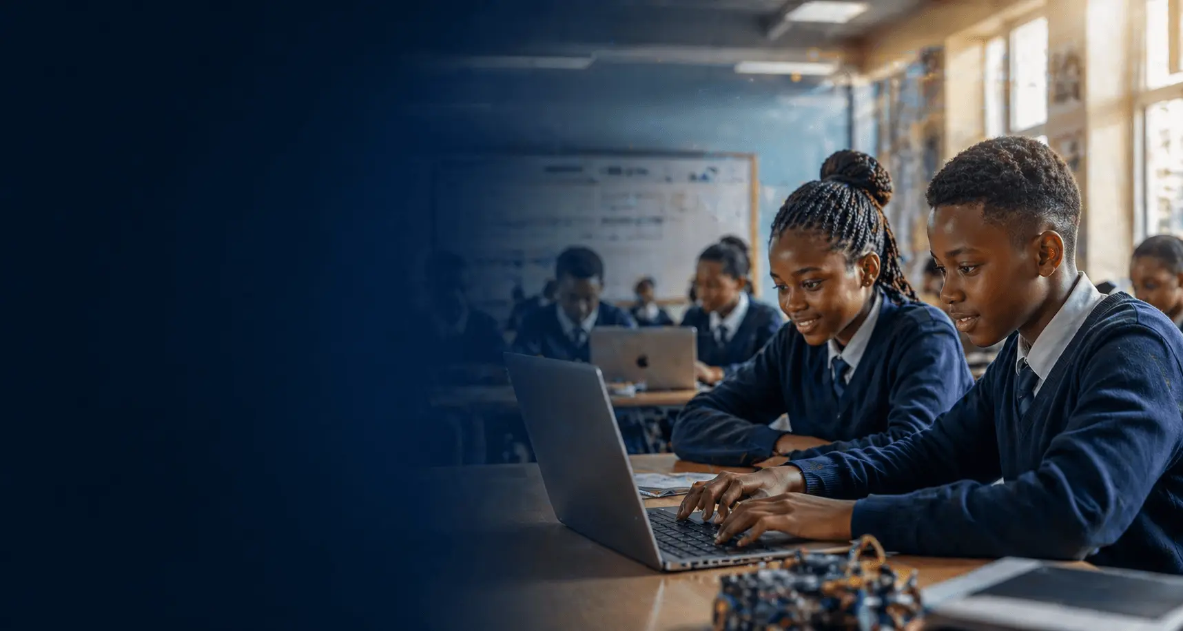 Students learning coding and AI using computers